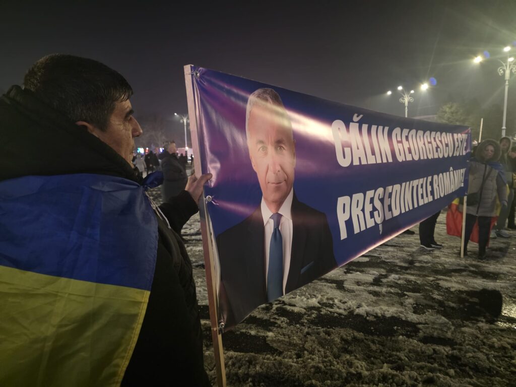 banner cu Georgescu, protest AUR